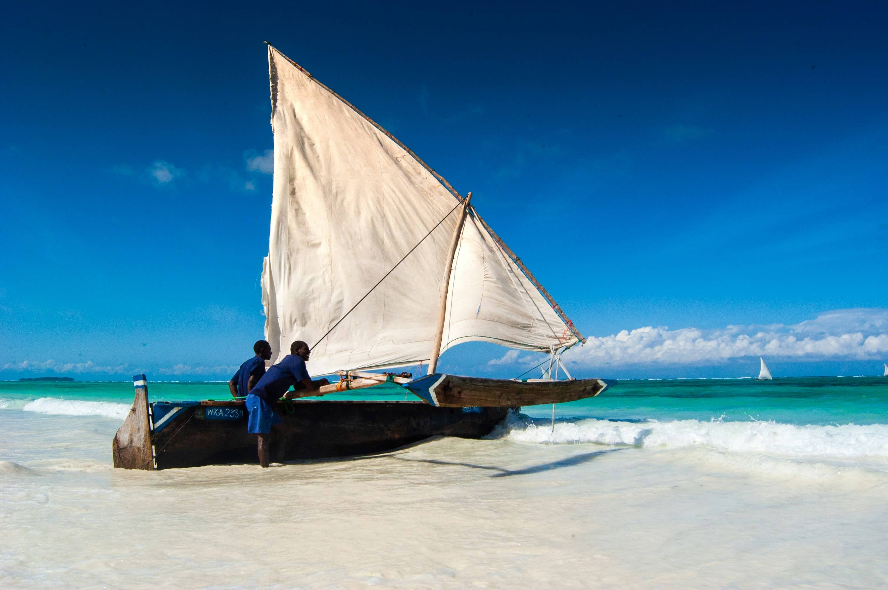 Traditional dhow boats sailing on the Indian Ocean in Zanzibar